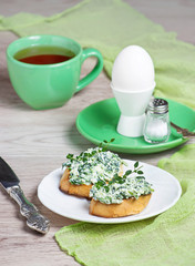 Toast with cheese and spinach for breakfast