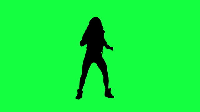 Dancer's silhouette against a green background