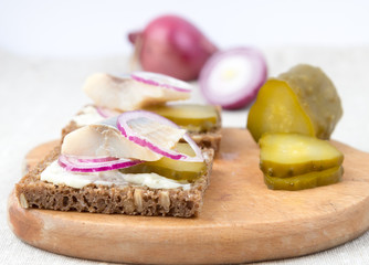 Herring sandwich with cucumber and soft cheese