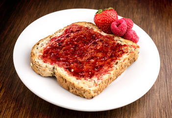 Mixed fruit jam on healthy whole wheat multi grain toast