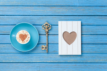 Cappuccino, key and photo frame