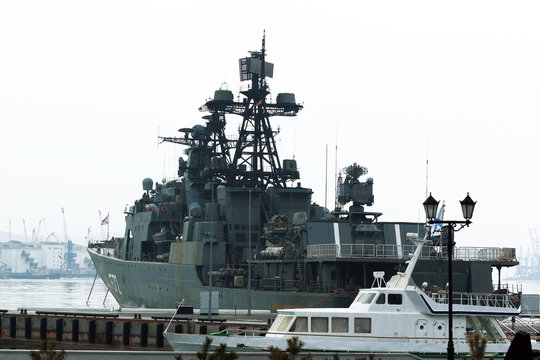 Russian cruiser in the Vladivostok near the pier