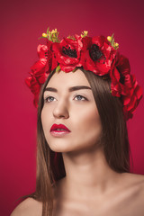 Naklejka premium Portrait of Beautiful Young Woman with a wreath on his head.