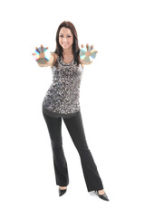 A young beautiful woman in silver dress posing at studio over wh