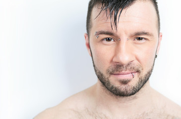 Obraz premium A sexy portrait of a man over a gray background