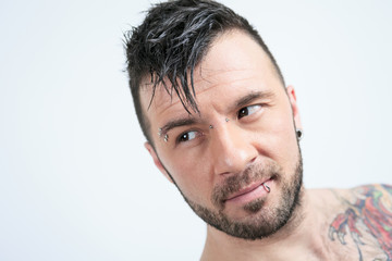 Obraz premium A sexy portrait of a man over a gray background