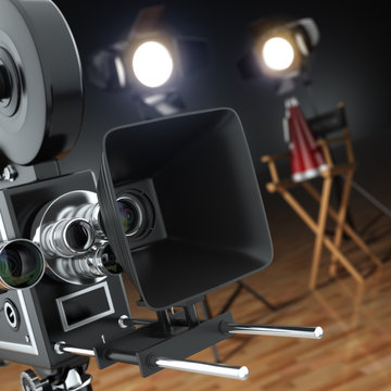 Video, movie, cinema concept. Retro camera, flash and director's