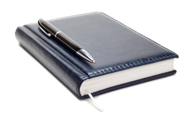 business diary with pen isolated over white background