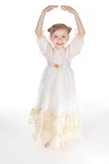 Beauty Ballerina young girl over white background