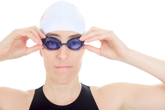 A woman swimmer in studio white background