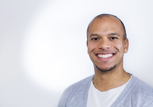 Portrait Of A Smiling Man Looking To Camera Proudly