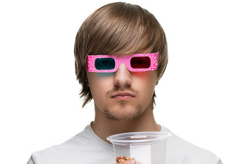 young man in stereo glasses with popcorn