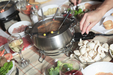 A fondue dinner with friend on a beautiful place