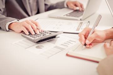 Business people discussing the charts and graphs showing the res