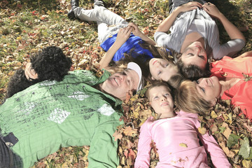 Fototapeta premium family throw autumnal leaves