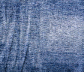 Crumpled vintage jeans texture.