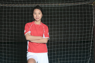 Obraz premium A female soccer player in a stadium