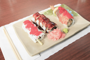 A social girl in a sushi restaurant