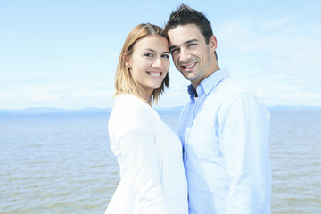 Obraz premium Young happy couple on summer season