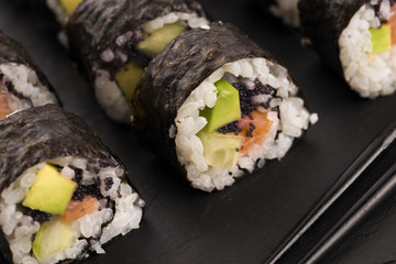 Salmon rolls served on a plate