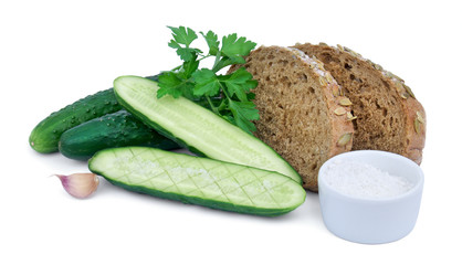 Сucumbers, bread and salt isolated on white background