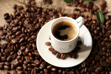 Cup of coffee on wooden table