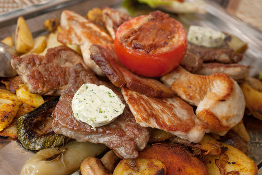 Plate with grilled meat and chicken in local Croatian restaurant