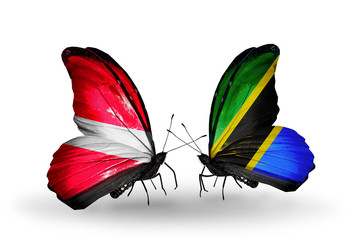 Two butterflies with flags Latvia and Tanzania