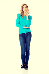 Fototapeta premium Young woman thinking