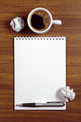 Notepad and coffee