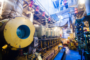 Engine room on a cargo boat ship, engine room on an oil platform