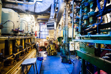 Engine room on a cargo boat ship, engine room on an oil platform