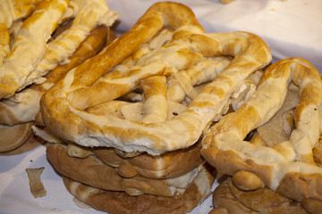 Group of salted pretzels on market stall