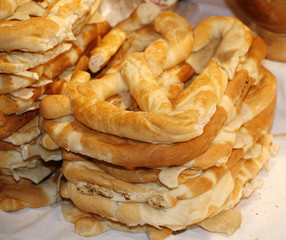 Group of salted pretzels on market stall