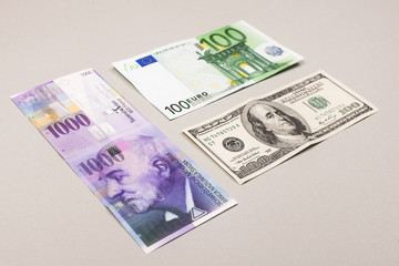 swiss francs, dollars and euro