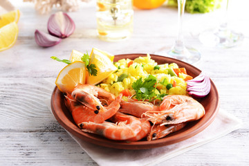 Seafood Paella on plate on table close-up