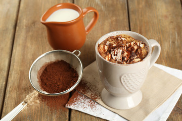 Cup of hot coffee with marshmallow and cup of milk with