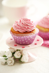 Delicious cupcakes on table  close-up