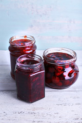 Fototapeta na wymiar Homemade jars of fruits jam