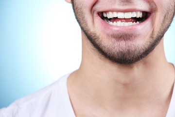 Fototapeta premium Smiling young man after visit dentist