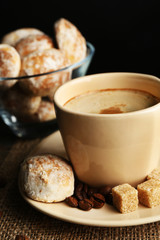 Cup of coffee and tasty cookies