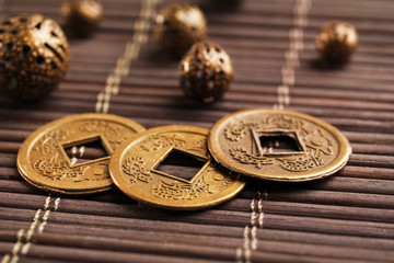 Feng shui coins on table close-up