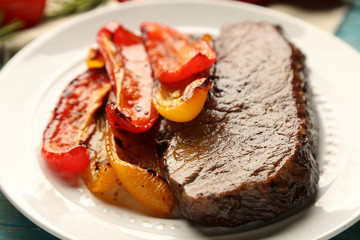 Composition with tasty roasted meat  and vegetables