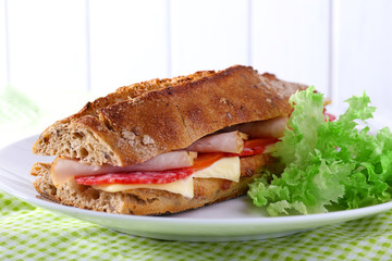 Fresh and tasty sandwich with ham and lettuce