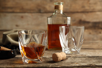 Whiskey on wooden background