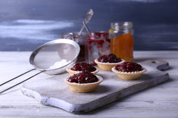 Delicious cookies with jam and powdered sugar