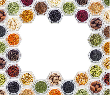 Various spices and herbs on white background.