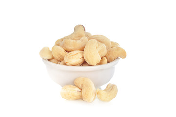 Cashew Nuts in white bowl isolated on white background