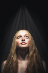 Fototapeta premium studio portrait of woman with flying hair