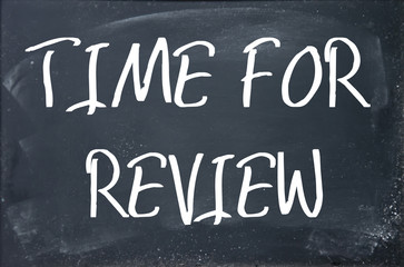 Fototapeta premium time for review texd write on blackboard